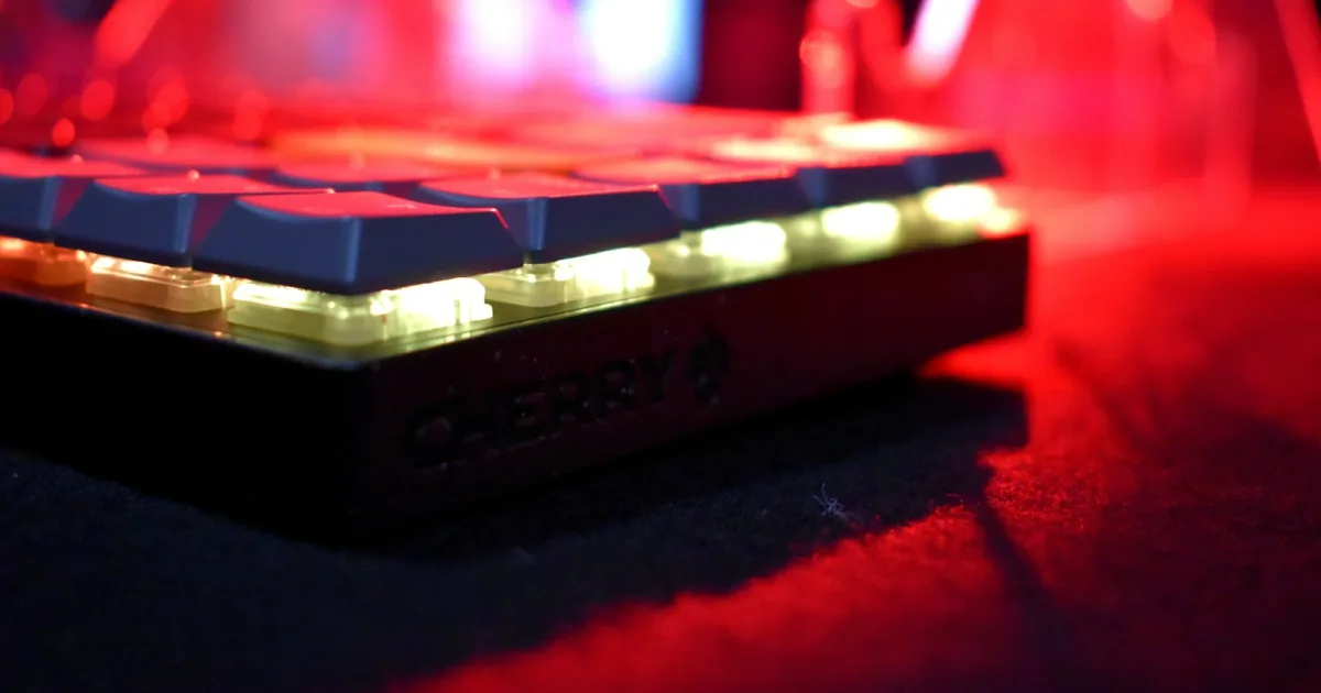 Close-up of mechanical keyboard switches lit by red backlighting