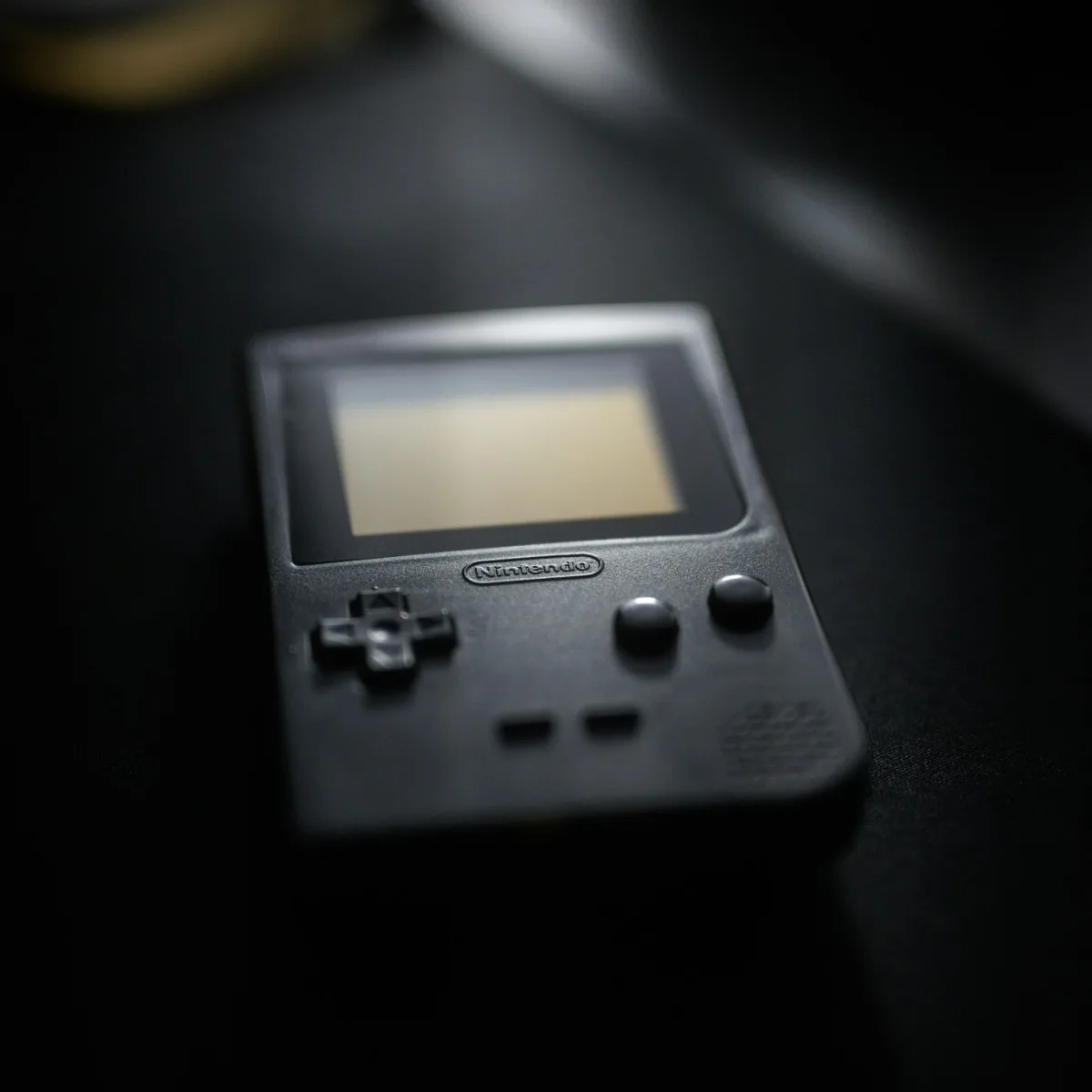 Rebuilt Game Boy Pocket handheld in a matte graphite shell